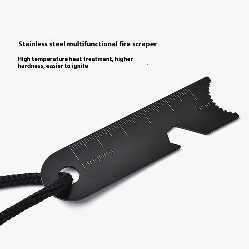 Black outdoor multifunctional flint tool with magnesium rod, steel scraper, whistle, and bottle opener.