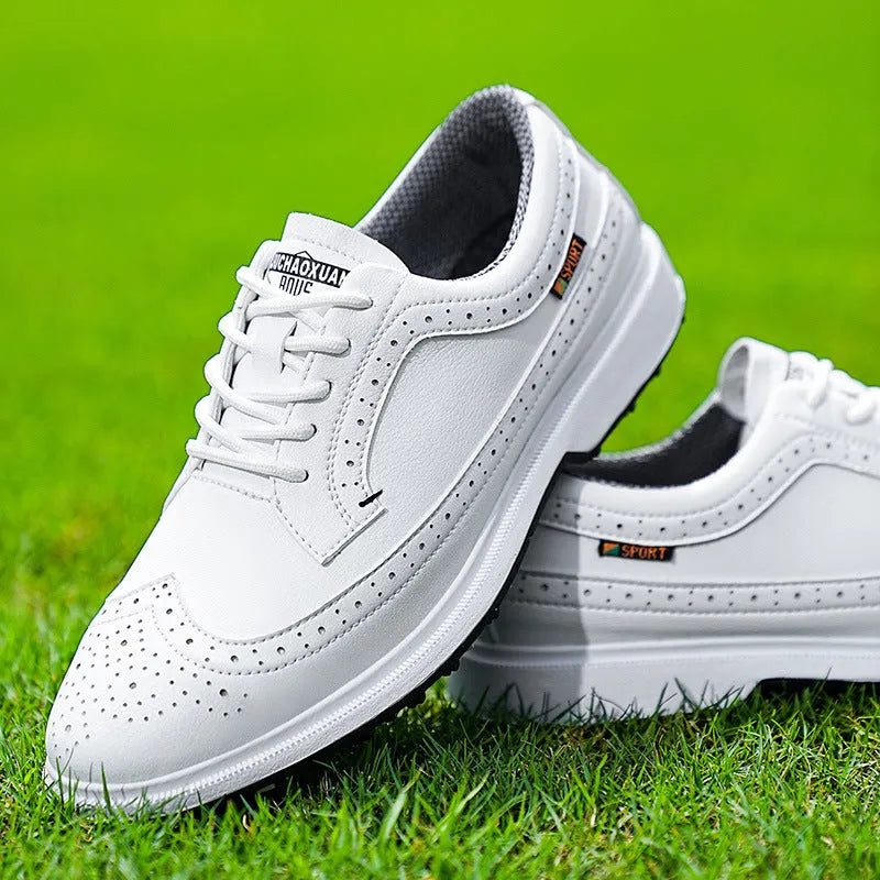 Men's Lake Blue genuine leather golf shoe with non-slip rubber sole on a golf course.
