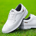 Men's Lake Blue genuine leather golf shoe with non-slip rubber sole on a golf course.