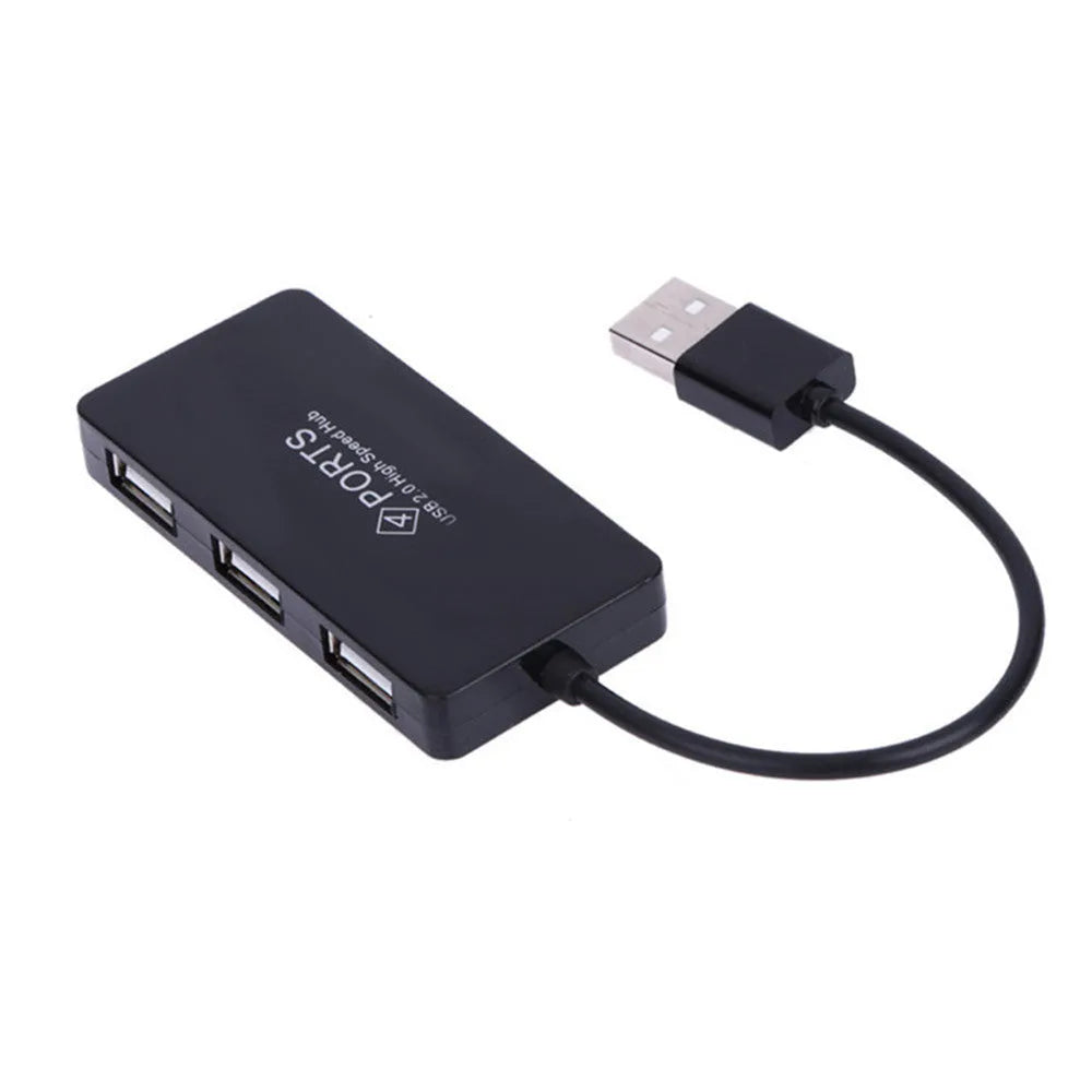 Black USB 2.0 4-port hub with cable and on/off switch on a desk