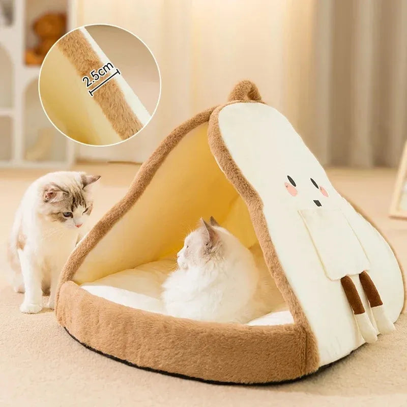 Green insulated cat tent pet bed with fleece blanket, shown in a home setting.