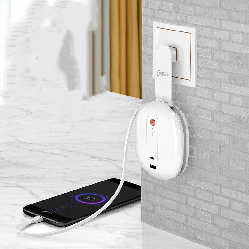White two-in-one power bank with fold-out AC plug showing 10000mAh capacity.