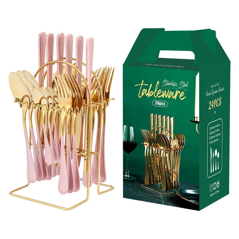 24-piece stainless steel cutlery set with storage rack in gold finish showing knives, forks, spoons