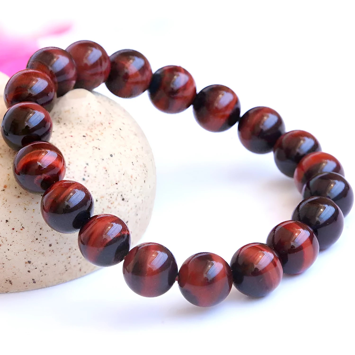 Red wood alexandrite bracelet with lightning cat's eye pattern and geometric beads