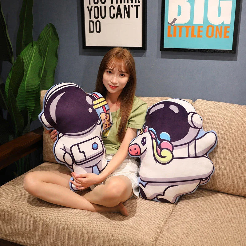 Cozy space-themed plush pillow with astronaut, rocket, and spacecraft motifs for kids