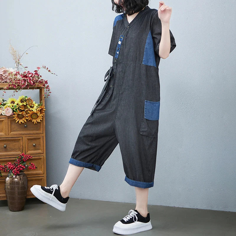 Women's Drawstring Denim Jumpsuit in blue and black with wide legs and cropped length