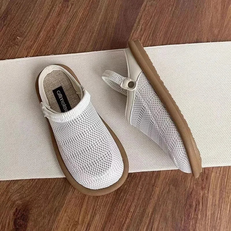 Breathable mesh slip-on shoes in beige with a round toe and low-top design on a rubber sole.