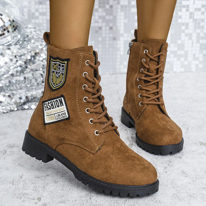 Stylish lace-up chunky heel boots for women in black and brown colors, featuring a round toe design and durable rubber sole for winter wear.