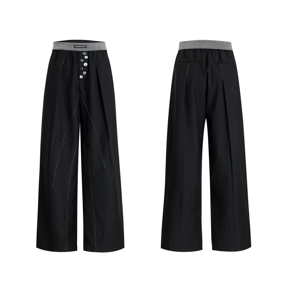 High-waist straight-leg trousers with a button detail on the leg in black or grey.
