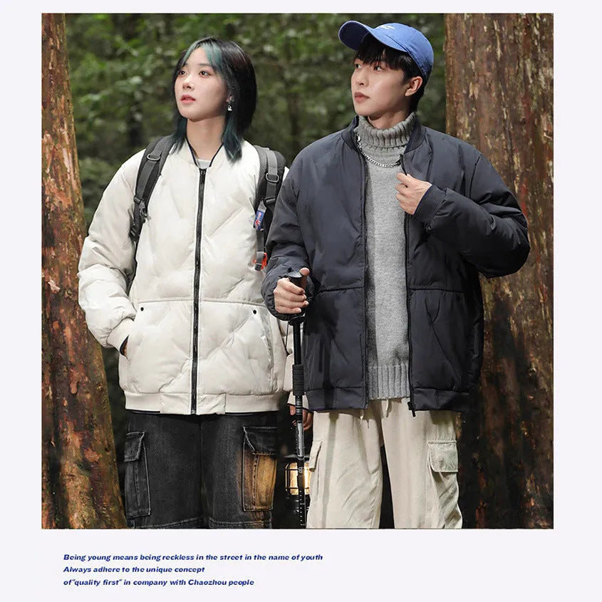 Loose thick cotton-padded coat with stand-up collar in neutral colours for winter warmth