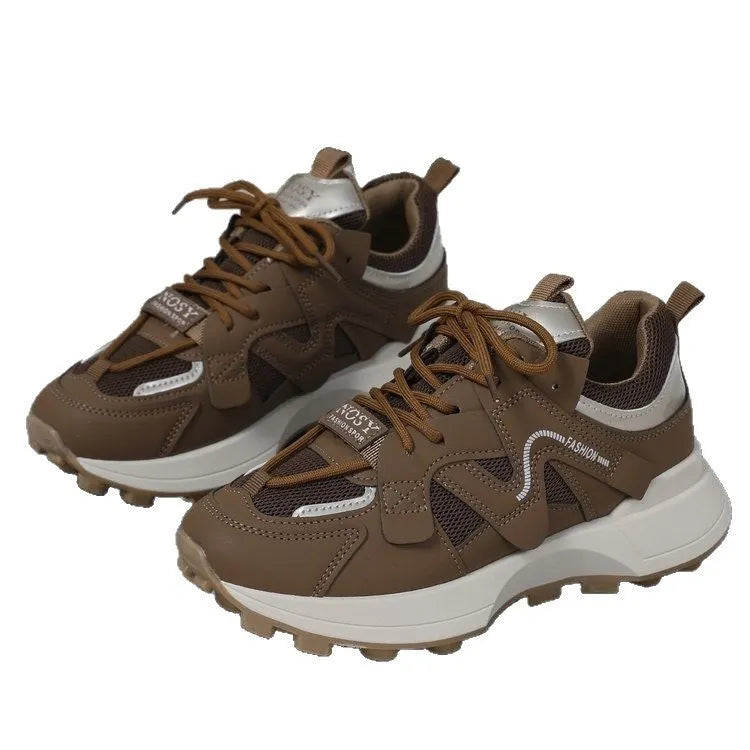 Brown casual clunky sneakers with round toe, lace-up closure, and flat rubber sole on a neutral background