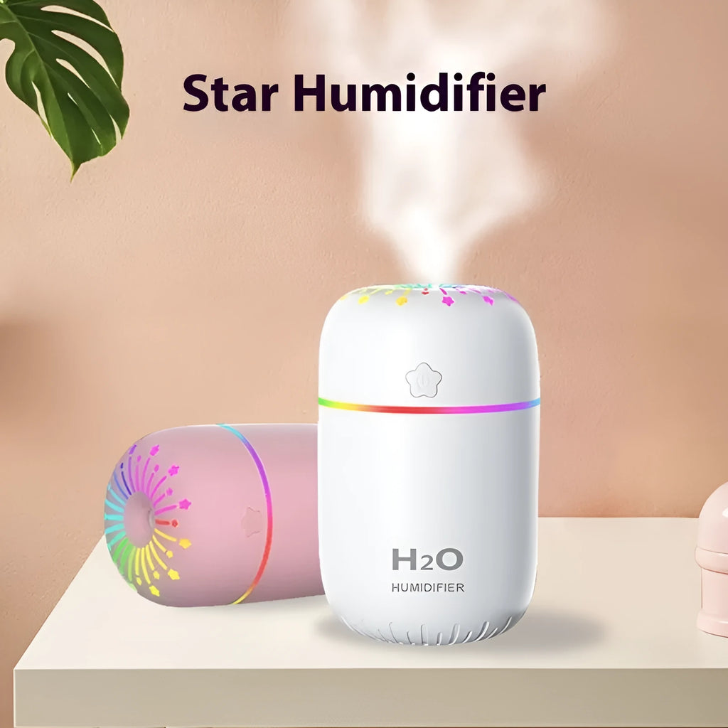 Compact white USB humidifier with 300ml tank beside laptop showing dimensions