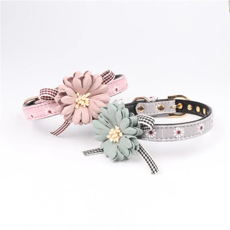 PU flower pet collar in dark pink with adjustable buckle, shown on a small dog