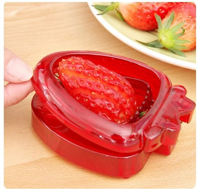 Red strawberry slicer with stainless steel blades for efficient and uniform fruit slicing