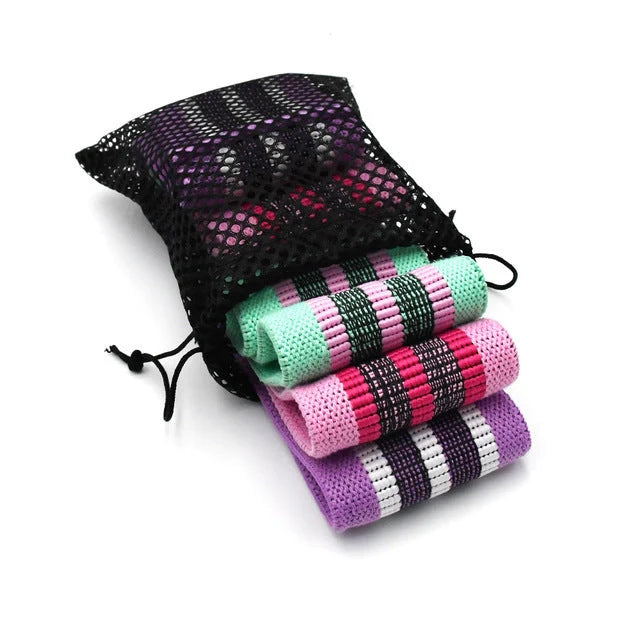 Latex mesh squat resistance band in lake blue, pink, and purple for hip and leg strengthening