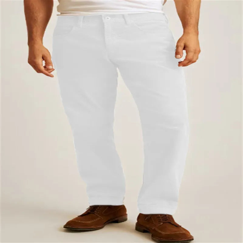 Men's solid colour corduroy trousers in a straight leg, loose casual fit on a hanger.