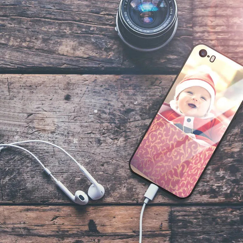 Custom patterned ultra-thin iPhone case with raised bumper edge, shown fitted on an iPhone.