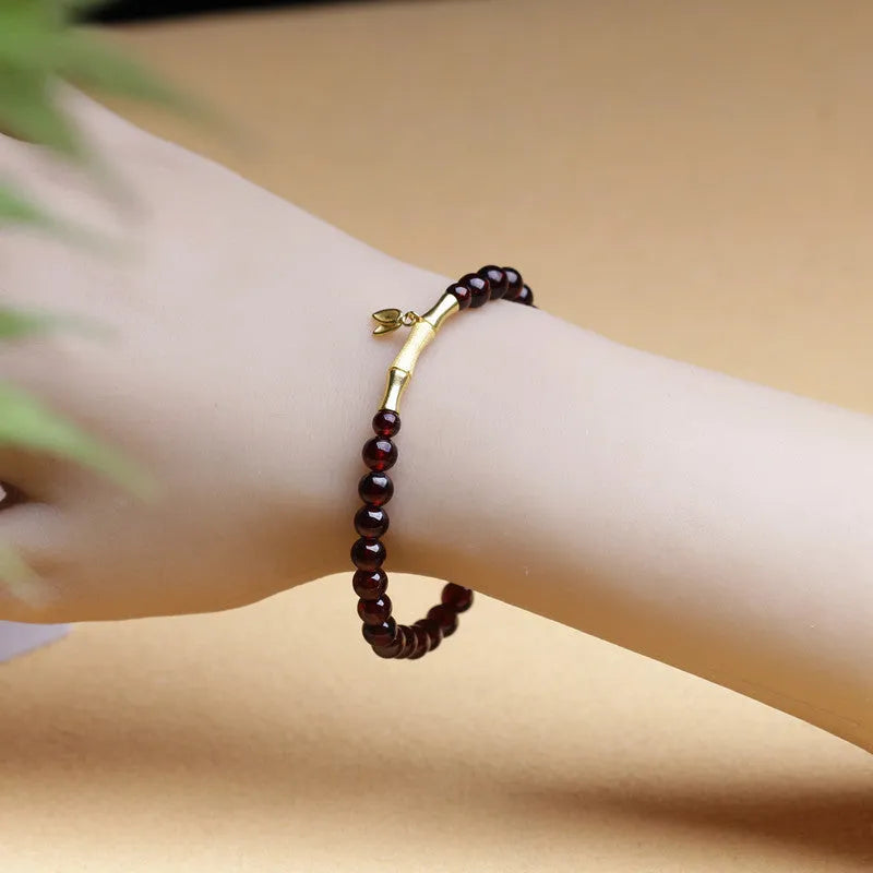 6mm garnet single ring bracelet with adjustable bamboo joint clasp in copper or silver finish