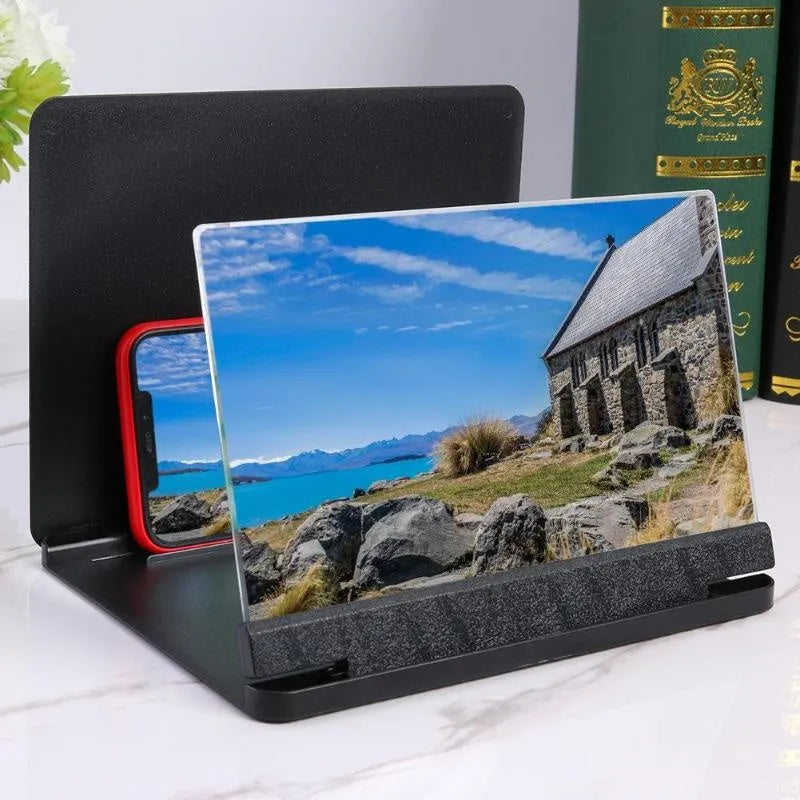 Black portable phone screen amplifier with integrated smartphone holder showing 9-inch plexiglass screen