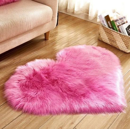 Soft, plush heart-shaped rug in various colors and sizes for comfortable home decor