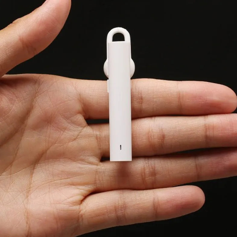 Wireless Bluetooth headset in black and white with compact 5.6cm design