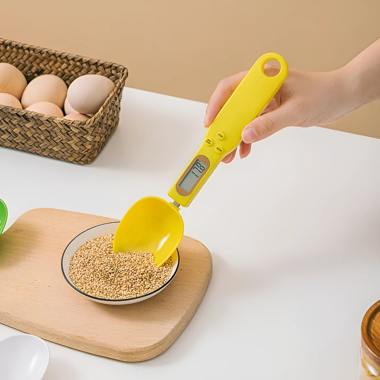 Digital spoon kitchen scale with LCD display showing weight measurement in grams