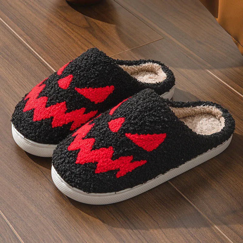 Halloween couple indoor slippers with embroidered lightning ghost face on suede upper in various colours.