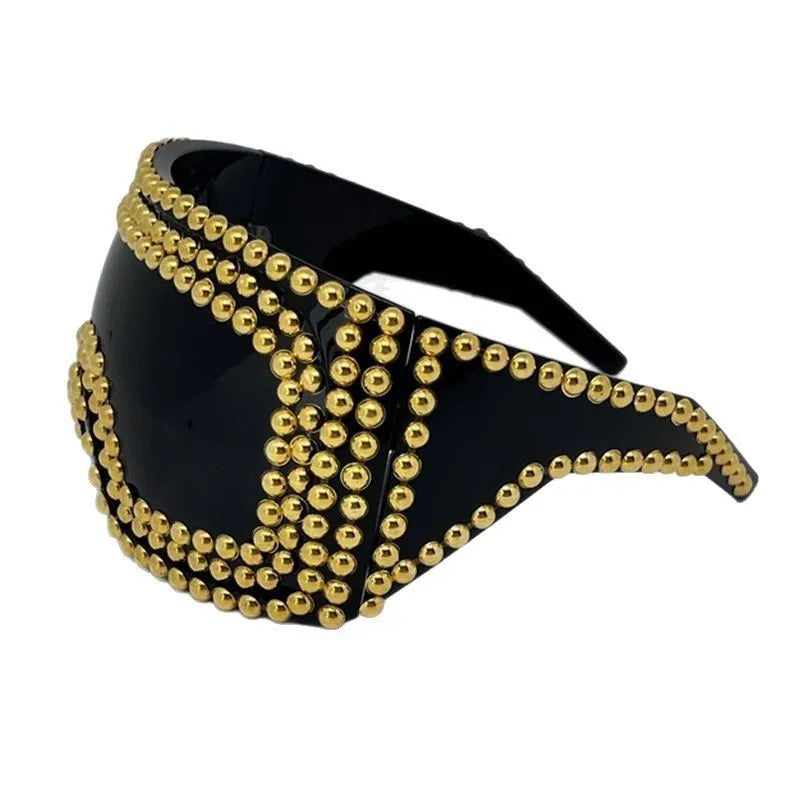 Men's punk-style sunglasses with large square silver frames and prominent rivet details.