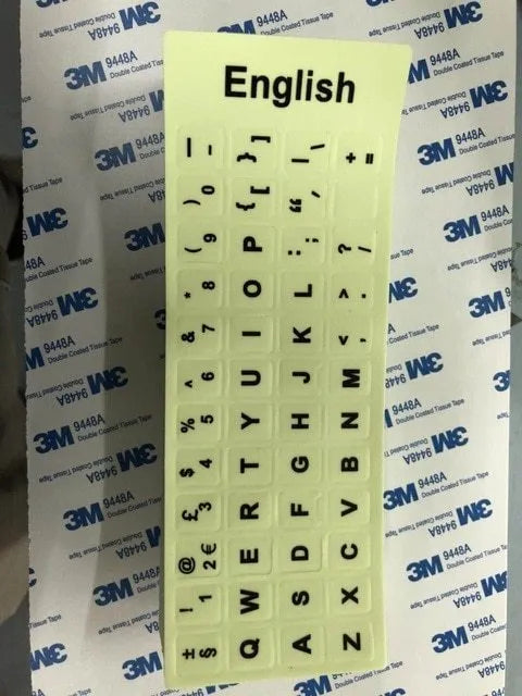 Yellow PVC keyboard stickers with glowing multilingual characters for desktop and laptop computers