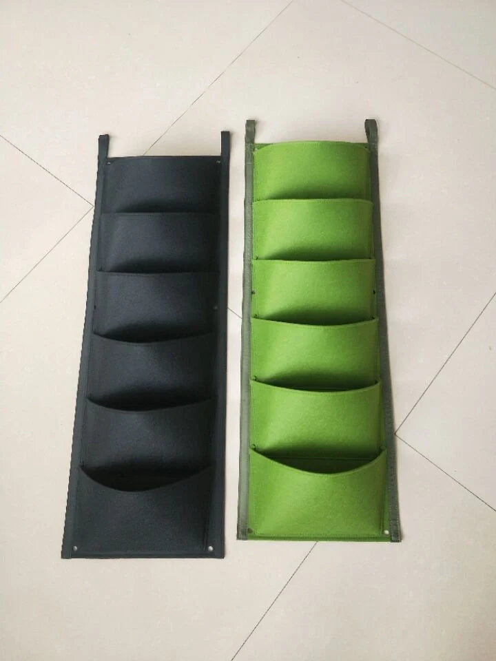 Wall mount hanging planting bags for vertical gardening in green and black
