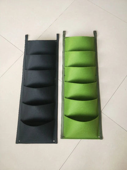 Wall mount hanging planting bags for vertical gardening in green and black