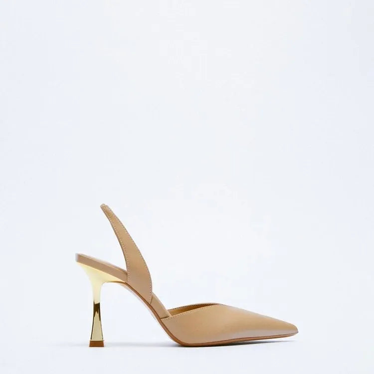 Women's pointed toe high heels in apricot colour with a shallow mouth design and glossy patent leather upper.