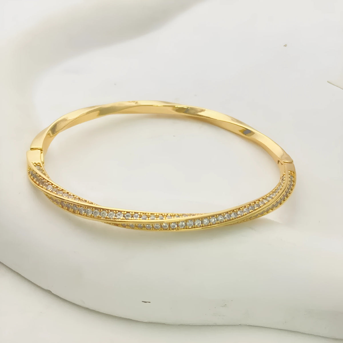 Real gold plated brass Mobius bracelet with half circle full diamond design in champagne gold colour