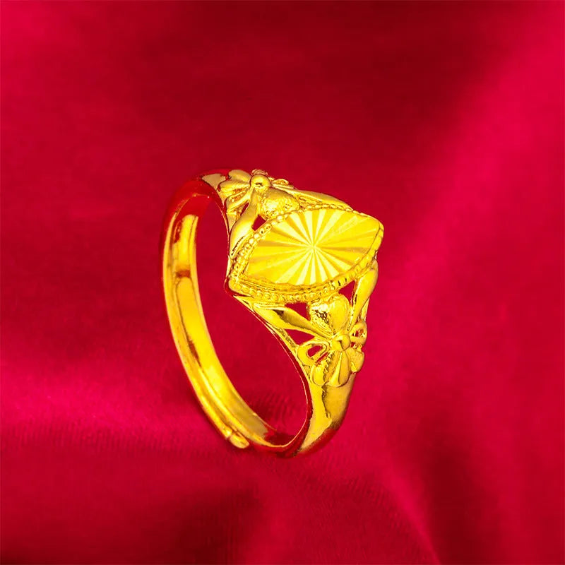 Open diamond flower ring in gold colour with geometric shape and textured details