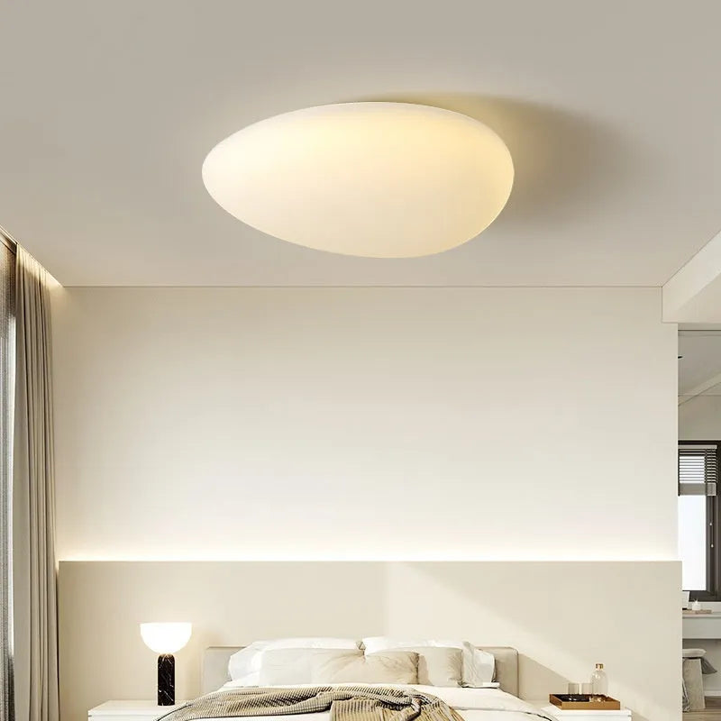 Modern minimalist LED ceiling light in white finish, 23cm diameter, for bedrooms