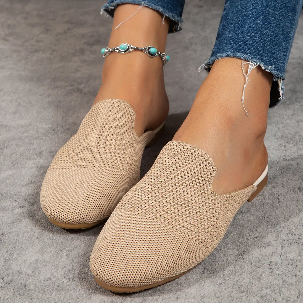 Apricot-coloured casual mesh slip-on sandals with a cloth upper and flat rubber sole.
