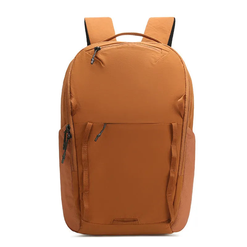 Solid-colour unisex backpack made from waterproof Taslan cloth with a curved shoulder strap.