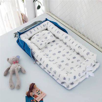 Foldable cotton portable baby crib in Animal World Blue, 90x50 cm with pillow and strap, weighing 1.3 kg