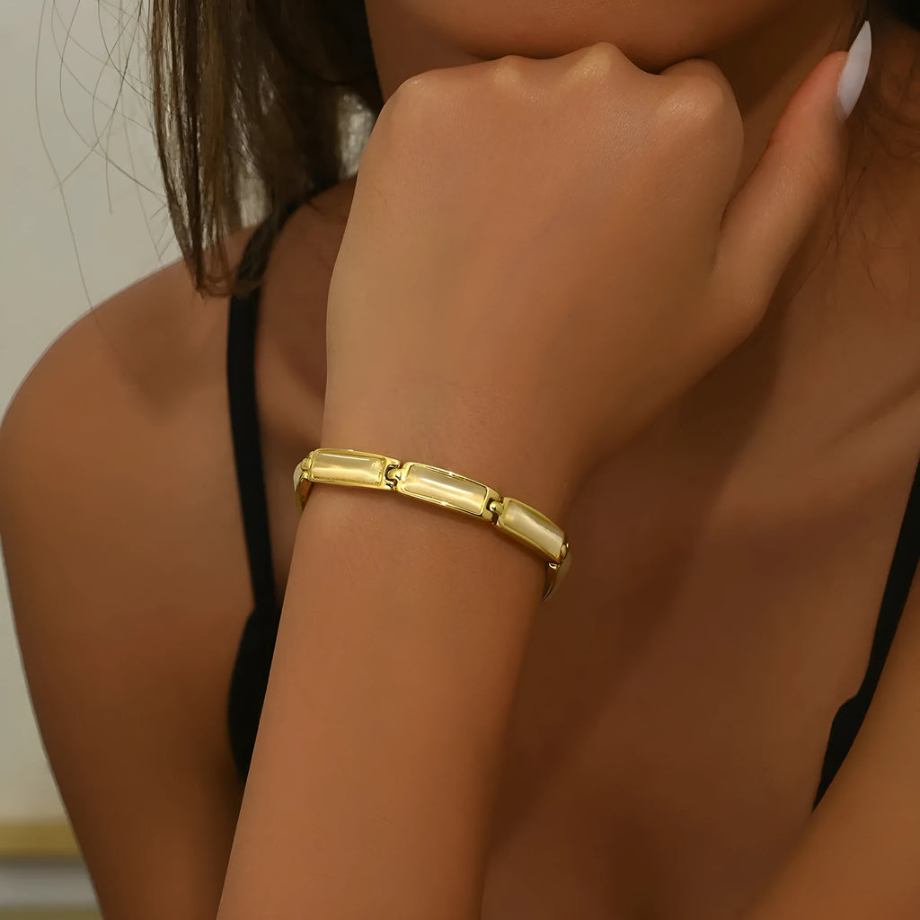 Geometric rose gold opal bracelet for women with quadrilateral alloy frame and gemstone inlay