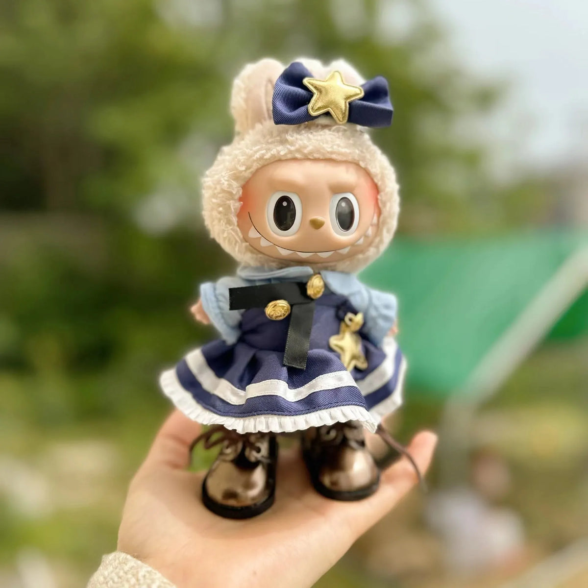 15cm doll clothes pendant in plush fabric, removable and washable, featuring a themed suit design for small dolls