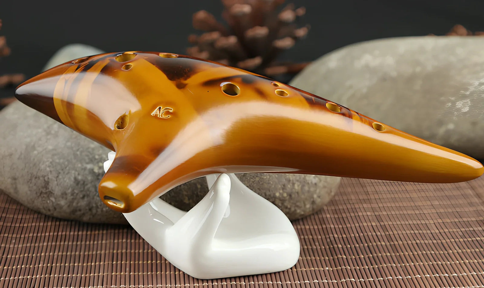Yellow 12-hole ceramic ocarina in Alto C with 13-note range and integrated lanyard