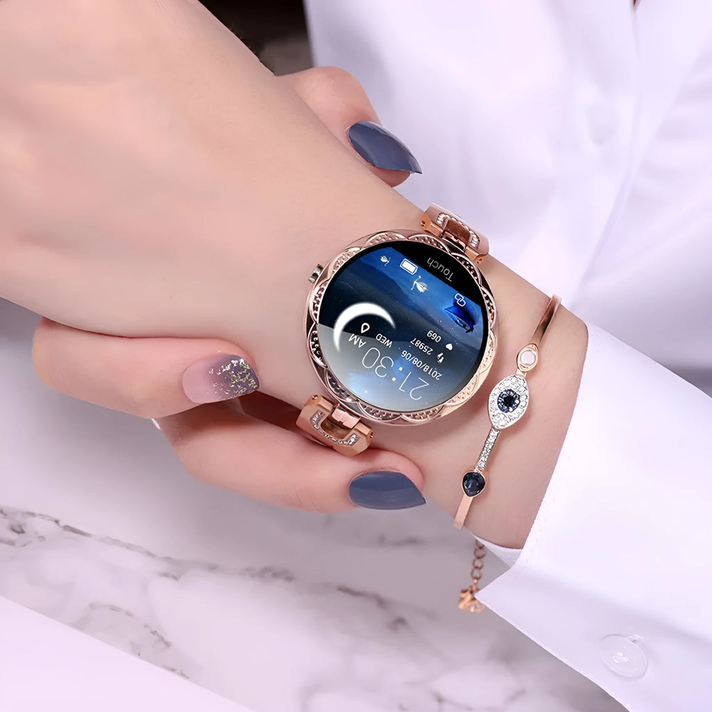 Fashion women's smart watch with round LCD screen and stainless steel strap in Rose Gold
