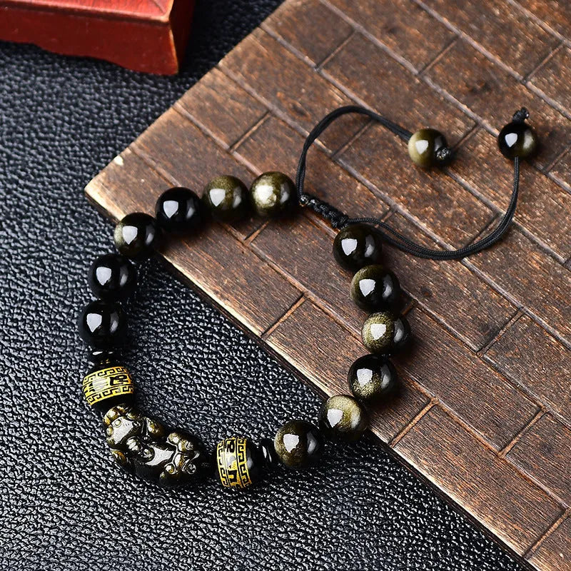 Hand-woven golden obsidian Pi Xiu bracelet with Chinese zodiac design