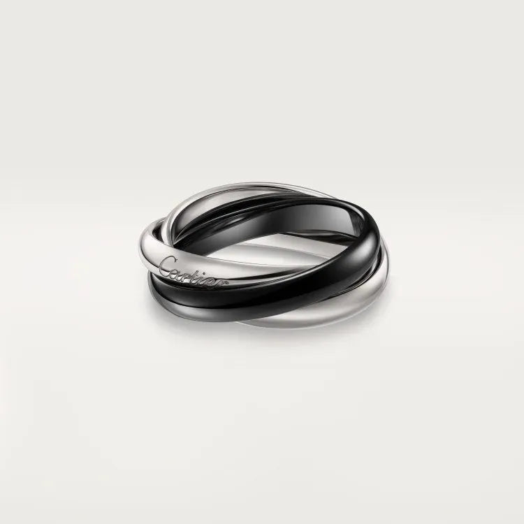 Sterling silver couple ring set showing full diamond, three diamond, and plain band options on a ring tray.