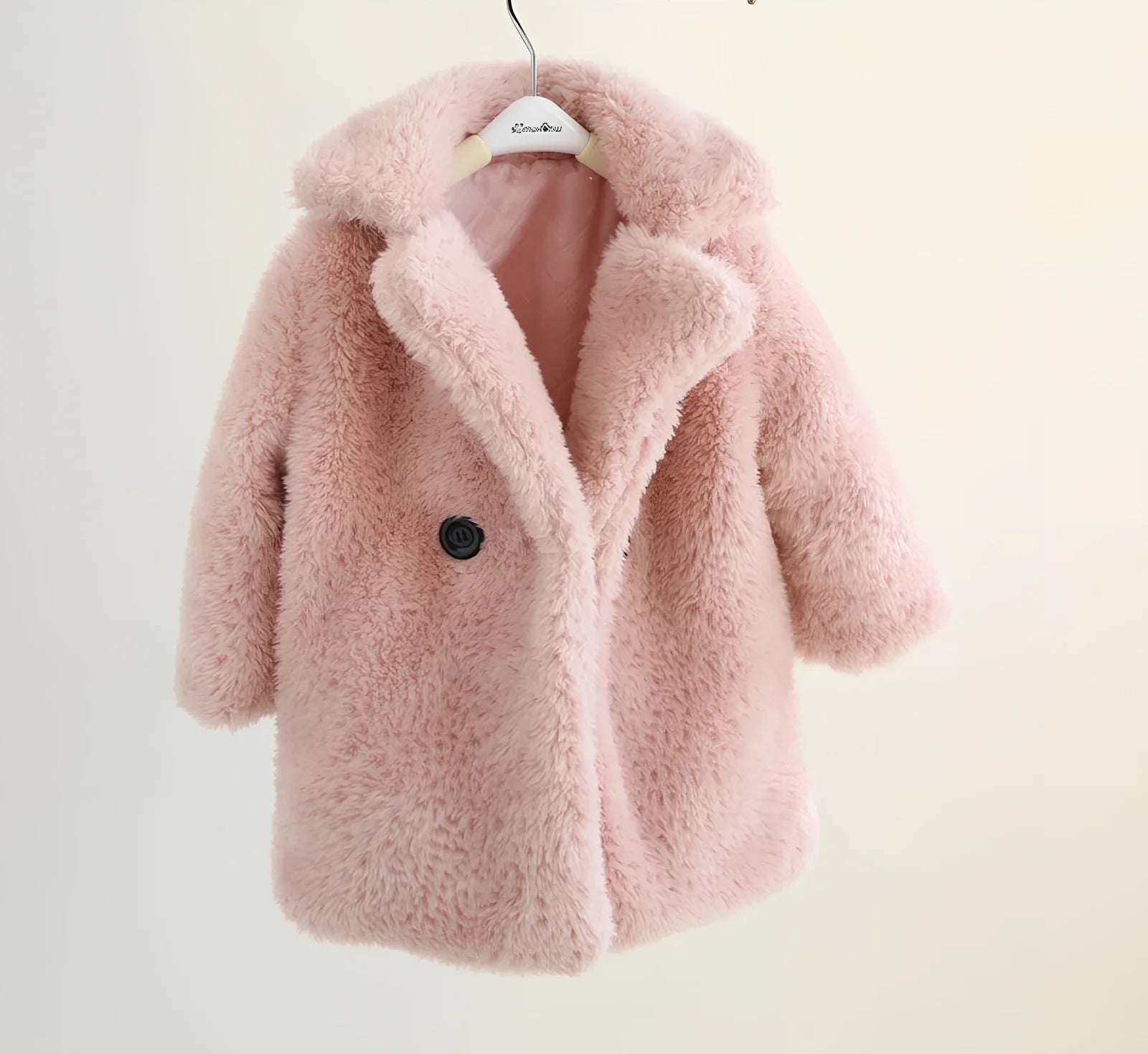 Children's cashmere fur coat in beige colour with suit collar and long sleeves for winter wear