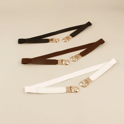 Women's fine leather waistband belt with multi-ring buckle in black, brown, and white