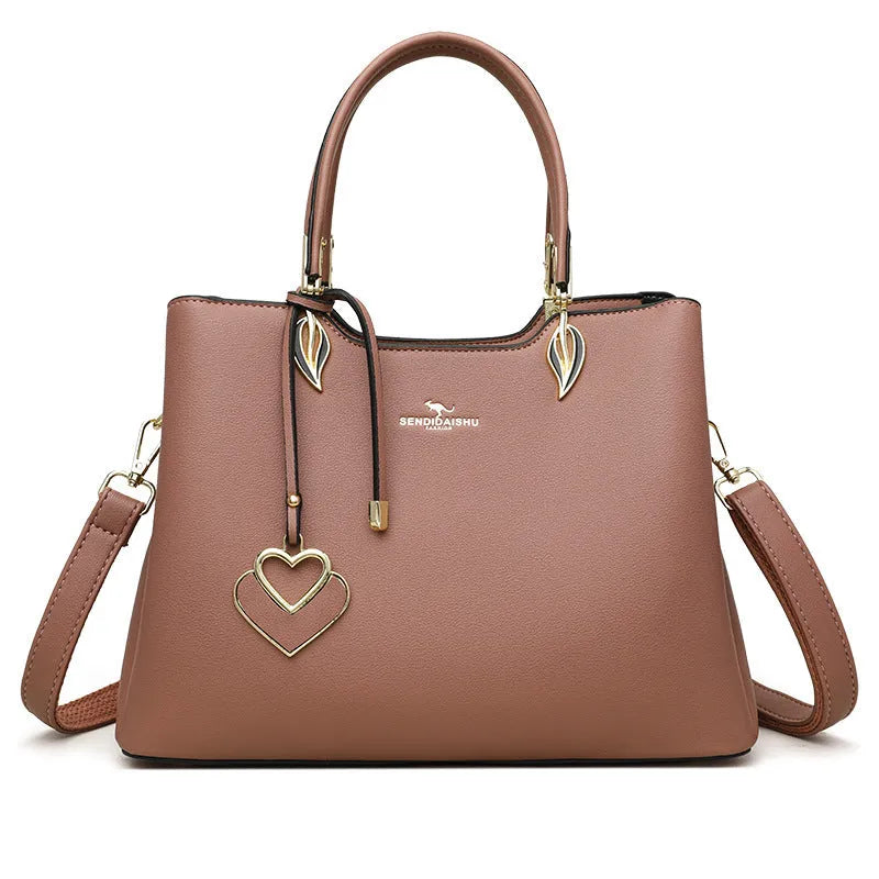 Women's black PU leather shoulder messenger bag with multi-layer compartments and sewing thread detailing