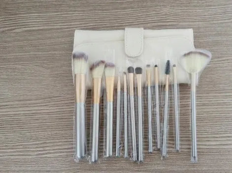 Persian makeup brush set with rice white bristles and champagne handles in 12, 18, or 24 brush options