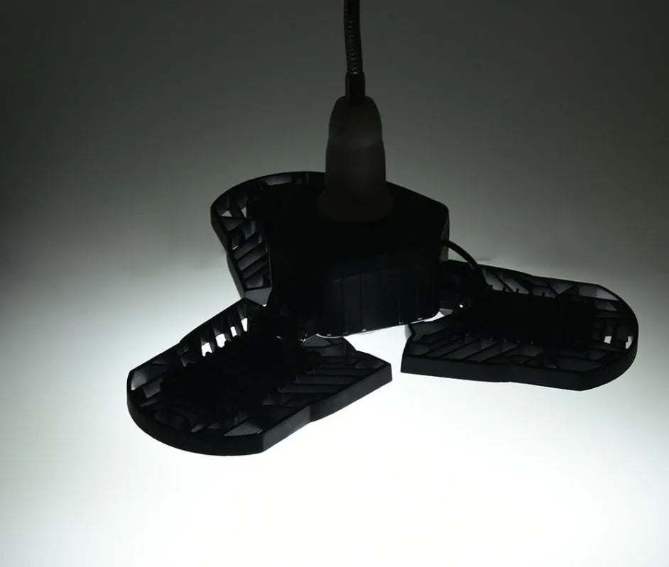 60W deformable LED garage light with three adjustable aluminium alloy heads on a white background
