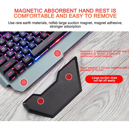 Black wired gaming keyboard with RGB backlight, phone holder, and magnetic wrist rest on desk